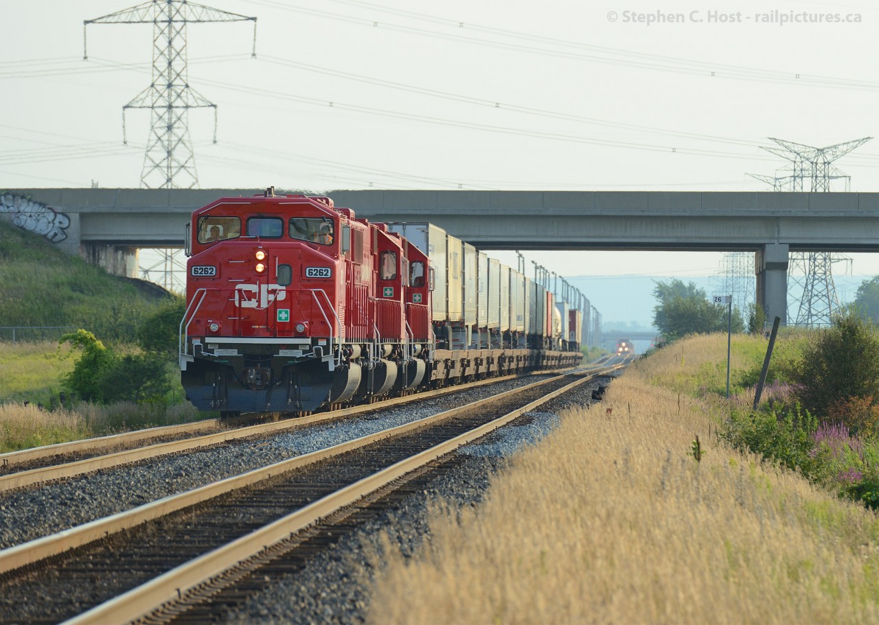 The rumours of my death have been greatly exaggerated.. and the SD60's are back! A triplet do the honours of hauling the Expressway between Milton, Ontario and Montreal, QC on August 20. Today's train was CP 6262, 6251, 6248.