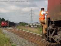 <b>Killean</b> siding is no more - as of 08/23/2013 this east switch, and the signal are removed, and the siding has been stub ended. Now it is called the "Killean Storage Track"<br><br>
In this photo, the conductor of the westbound CP rack train, CP 9640 west (no other power) has manually thrown the switchto normal it and proceed westward. Train 142, the St. Thomas, Ontario to Oshawa, Ontario frame train is impatiently waiting to depart eastward. This was the last run of the scheduled Frame Train - the next day CP annulled the train opting instead to run the GM Oshawa traffic on Woodstock locals, being lifted by other trains en-route.