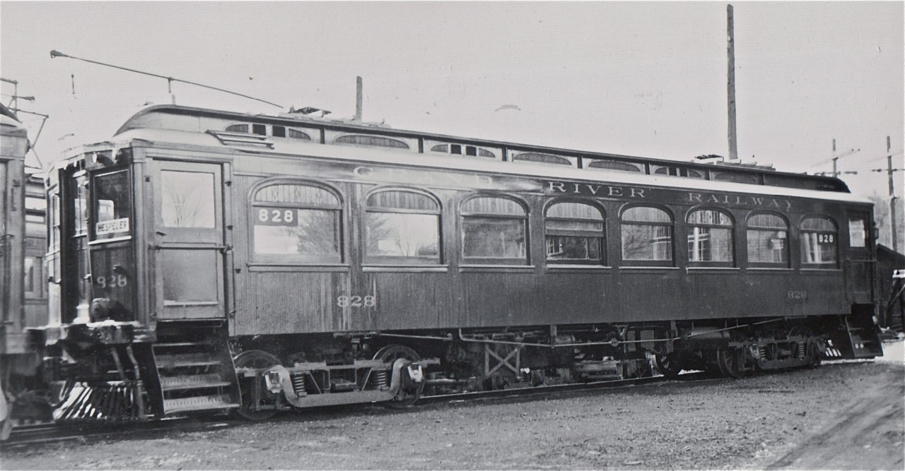 Grand River Railway 828 was built locally, by the Preston Car & Coach Company, in 1912.  Employed in its later years primarily on the short run between Preston and Hespeler, it was converted to a work service car soon after this photo was taken at Preston yard.  828 was broken up in 1953.