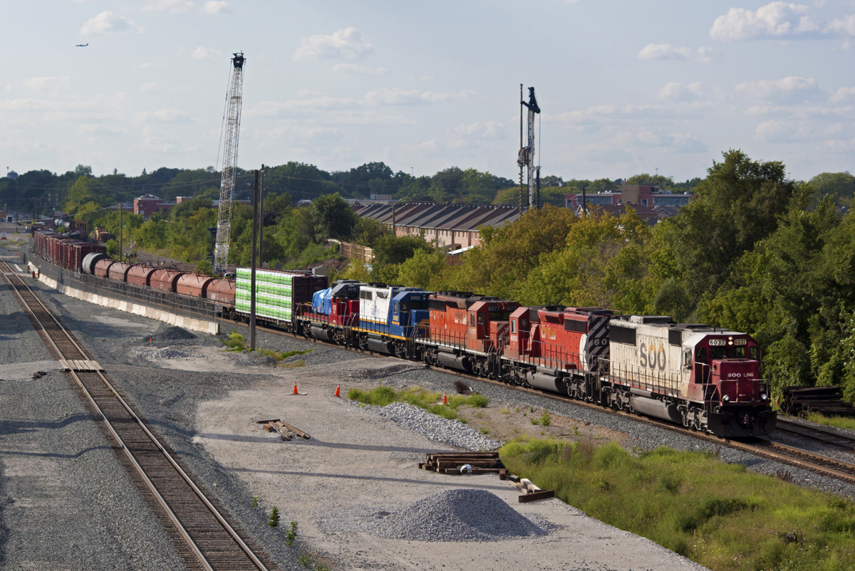 Hard to imagine this was taken less than a year ago. SOO 6037 leads a day late 422 south into Toronto during the evening rush hour. We were fortunate enough to have the train run out of fuel at Spence overnight, which gave us the opportunity for a daytime shot.