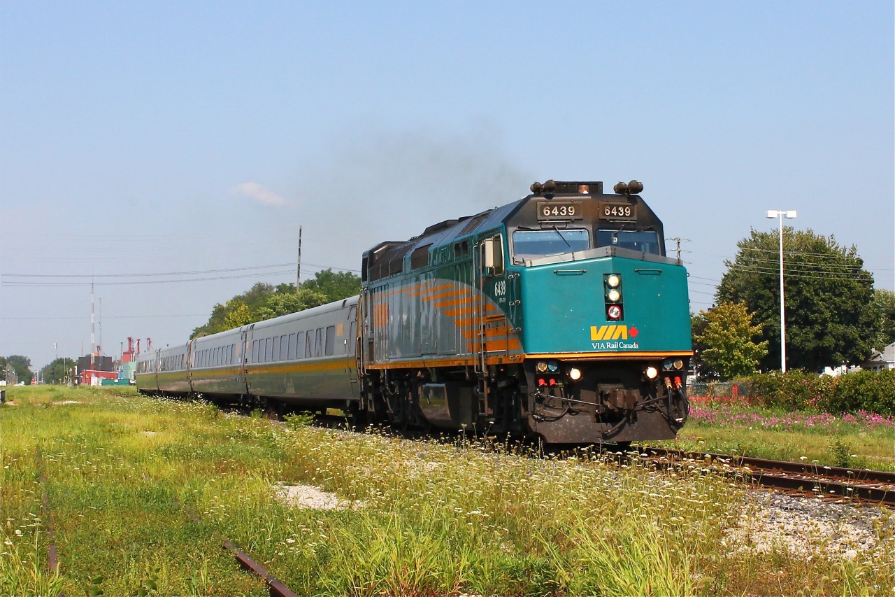 F40PH-2d 6439 smokes it's way out of Chatham station with the afternoon Westbound to Windsor Ontario. The grimy number boards hint at this locomotives journeys.