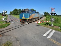 By a gorgeous morning, VIA #30 is about to cross the Glen Robertson Road crossing.
