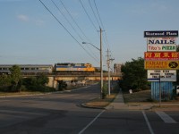 For a while I felt that this view needed to be captured with a train so I finally tried for a shot. This scene goes back two years in the summer of 2011. Here we see VIA F40PH number 6451 in its previous livery prior to the current one that drapes most or all VIA F40PHs now. Even the VIA didn't do justice to shatter the silence of this quiet scene of Westwood Drive and Westmount Road in the west end of Kitchener, in the subdivision of Victoria Hills. Note the old CN bridge with the CN noodle barely visible.