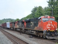 CN 2317 leads a mixed freight east through Parry Sound.