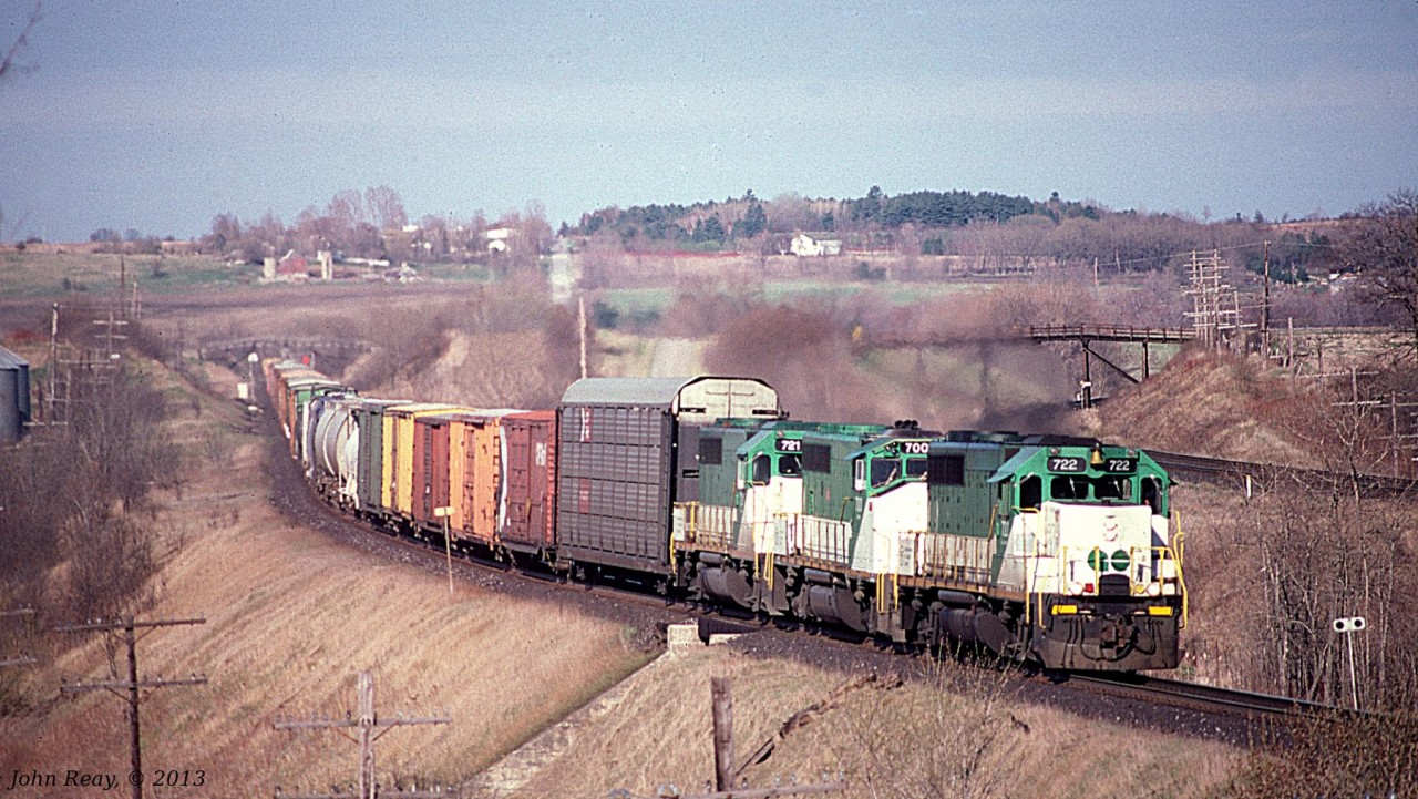 Three GO Transit weekend leasers power this CP westbound on the Belleville sub in April 1988. This was shot looking south east from Bests Road (off Wesleyville Road south of highway 401.) Don't bother today, as it's totally overgrown.