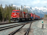 ES44AC 8869 is eastbound approaching the east switch at Gap mile 62.4 of the Laggan Sub.