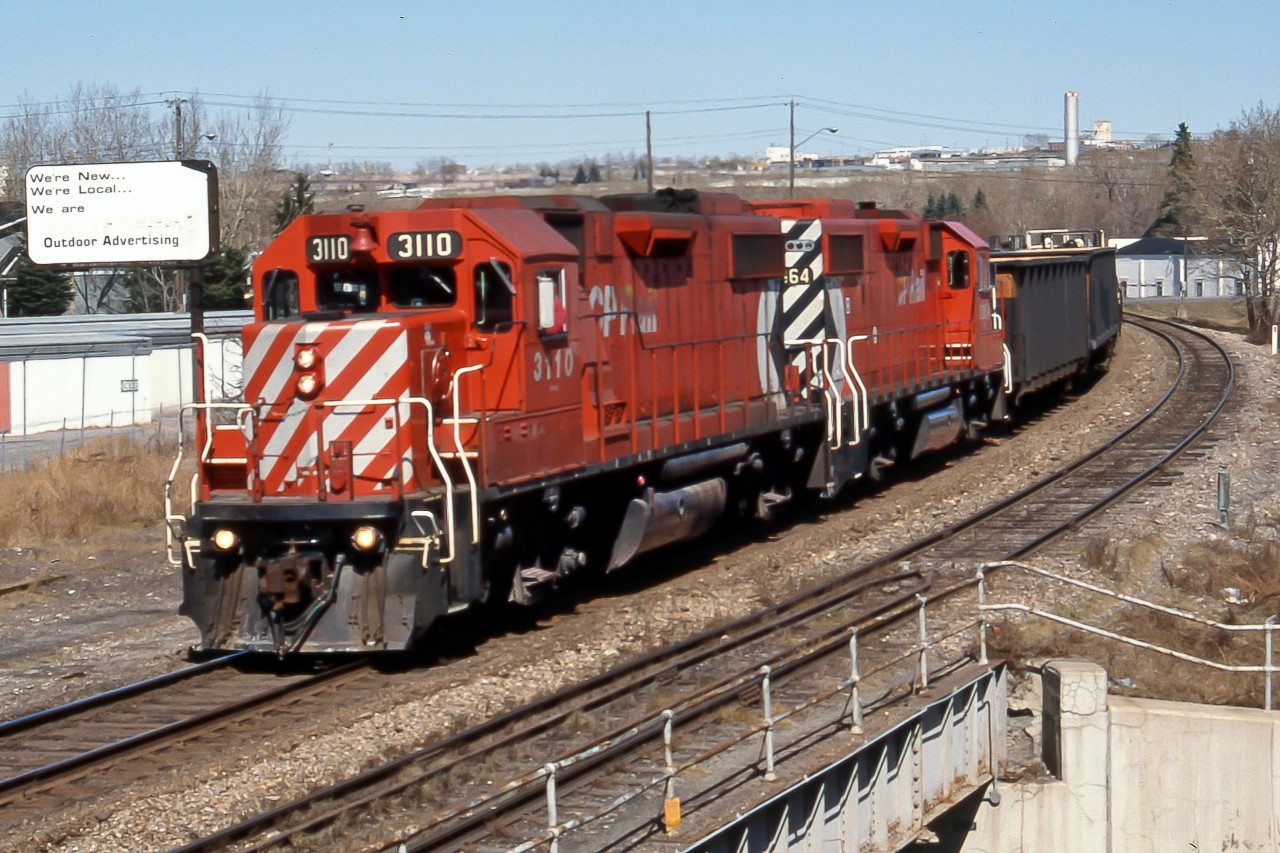 GP38-2 CP 3110 and 3064 bring the Red Deer way-freight into Alyth Yard