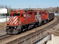 GP38-2 CP 3110 and 3064 bring the Red Deer way-freight into Alyth Yard