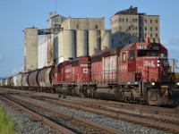 With a lengthy train in tow, STL&H 5615 heads west.