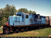 Norampac GP9 #169, former Quebec Northshore & Labrador #169, is busy switching the paper mill in Red Rock, Ontario this day.  The unit has just switched a cut of cars that the CP had setoff here a few hours earlier.  Today, as I understand it, the paper mill in Red Rock is closed and the unit has moved on to become CANAC 8701 and is back switching paper at the mill in Marathon, Ontario.  
