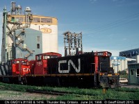 CN GMD1's #1180 and 1416 sit idling near "Pool 7A" in Thunder Bay waiting their next call of duty to switch the 100's of grain cars that come in an out of the Thunder Bay terminals.