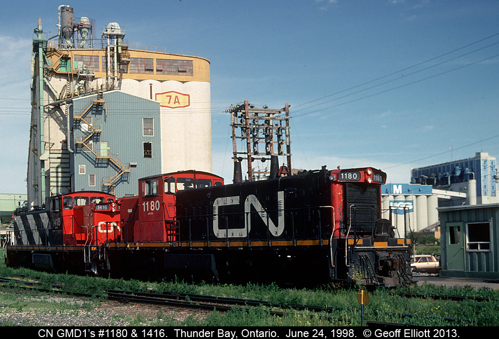 CN GMD1's #1180 and 1416 sit idling near "Pool 7A" in Thunder Bay waiting their next call of duty to switch the 100's of grain cars that come in an out of the Thunder Bay terminals.