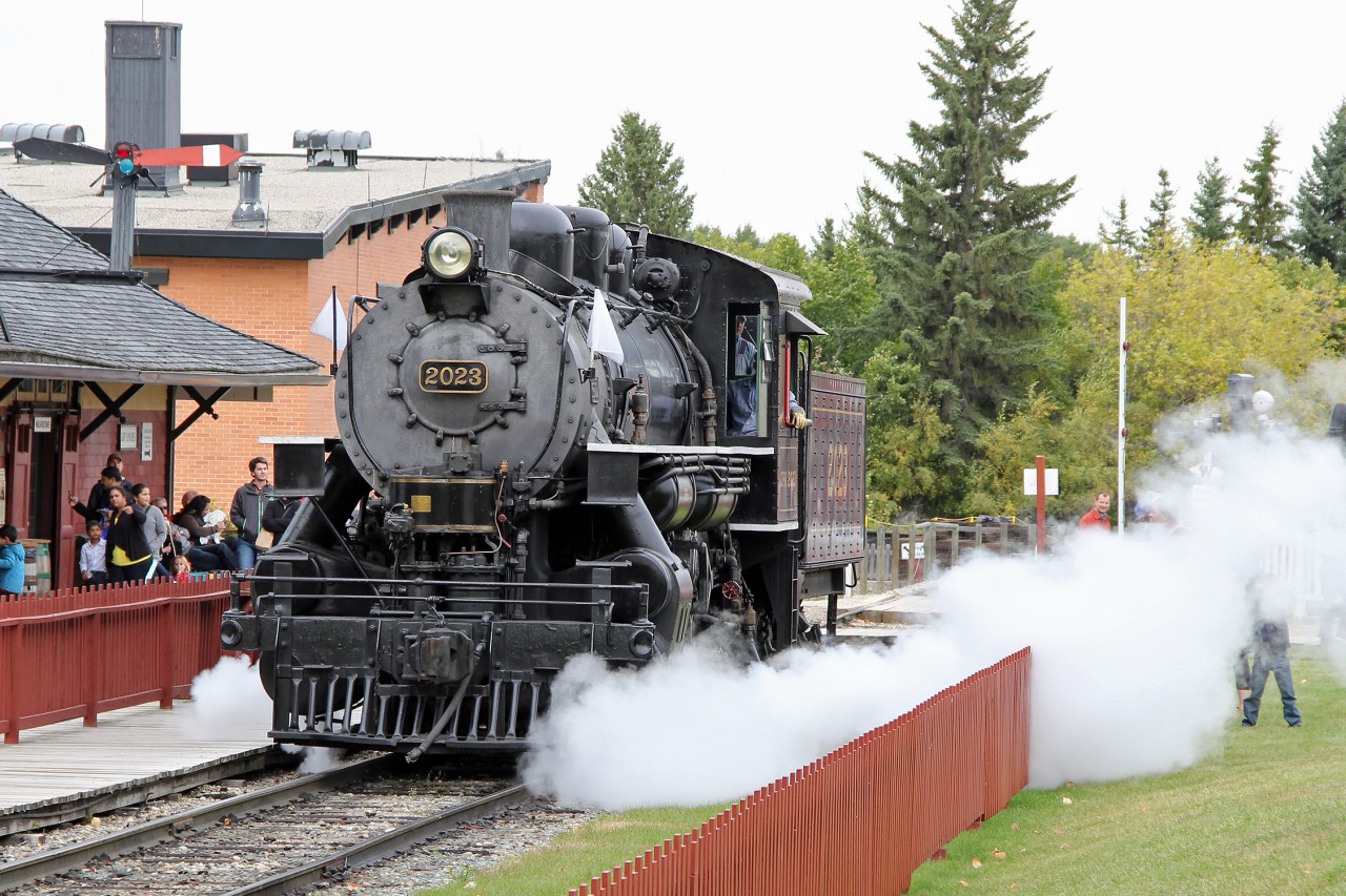 0-6-0 Alco CP 2023 has detached from the double header and is running light round the park to pick up the freight train.