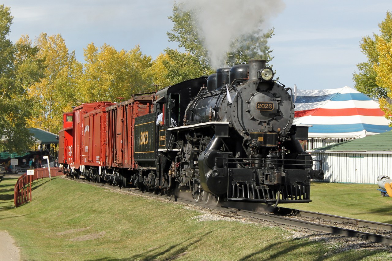 Having picked up the freight train Alco 0-6-0 CP 2023 continues with demonstration runs and caboose rides for the rest of the day.