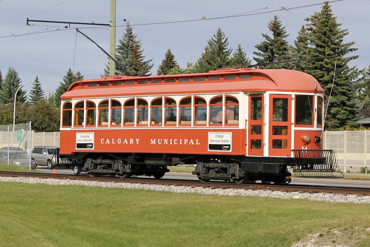 Calgary tram #14 is a replica rebuilt body on the original 2-truck chassis.  The tram takes customers from the parking lot to the main entrance of the Heritage Village.