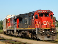 CN 2104 (ex-UP 9069, CNW 8557) and CN 2113 (ex-UP 9078, CNW 8566) leading 148 on a clear September morning