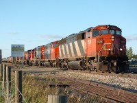 A great 6-unit all-EMD/GMD consist of CN 5529, 5266, GTW 5937, CN 5279, GTW 5933, and CN 9581 pull their train south headed for Walker Yard. This mixed freight train was around 136 cars long, with many being loaded (centerbeam flat) cars, which maybe explains why such a large (18,800 hp) consist was used. Some units may have been inactive though.