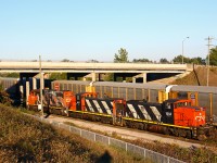 A nicely matched pair of CN's GMD-1's make a move at the west end of Aldershot yard while building the night train to Oakville (with CN 4784 along for the ride, not running). These are two of CN's three GMD-1's in eastern Canada, with CN 1412 presently operating out of London. 