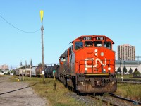 Bright and early in the morning, CN 438 arrives at CN Racecourse yard in London with a short train of 12 cars. After setting out their train, the crew waited almost six hours to depart after waiting for CN 509 to arrive with their westbound cars, and for the Racecourse job to assemble their train. With CN now running on the VIA Chatham sub, they have to time their departure so as not to interfere with VIA passenger train movements. If they aren't ready to depart westbound by 13:00, they must wait until 16:00 to avoid conflicts with VIA 73 & 76.