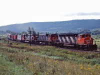 CN 5297, CN 2325 and CN 2035 lead a westbound extra into Saint Basile, New Brunswick, the crew is about five miles away from a crew change at Edmunston.