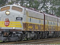 On the weekend of August 17th, the cities of Port Coquitlam and Port Moody held their respective Centennial celebration events. CP assisted in these milestone events by providing the Royal Canadian Pacific power and a few coaches to the cities for public rides during the two days.

The consist included the CP 4106 & 4107 (GMD FP9u’s), and the CP 1900 (GMD F9B). None are original CP stock. The train had Power Car CP 96, Coach “Dominion” CP 101, Coach “Smokey Smith” CP 102, and Business Car “Mt. Royal” CP 73.

On Sunday the 18th, the train made two trips from Port Moody to Mission return. This photo is of the second trip East taken from Kennedy Road in Pitt Meadows BC looking West towards the Pitt River Bridge at mile 109.6 on the CP Cascade Sub.