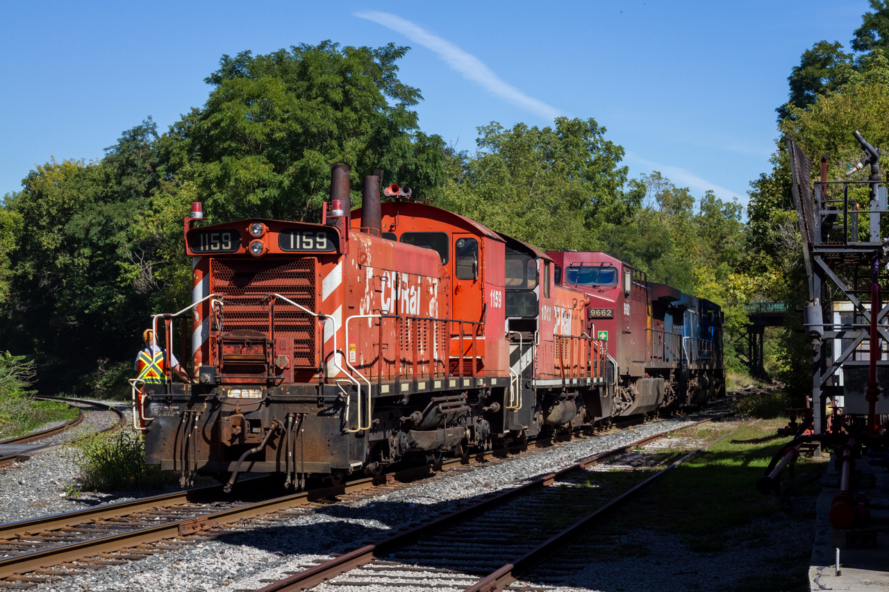 CP 1159, an SW1200RS 'Yard Control Unit' is on the tail end of an eclectic lash up as they head back towards their train on the Dundurn Street/Aberdeen Wye, after setting off their steel loads at Aberdeen Yard.