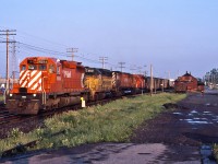 CP 5554 leads an early morning eastbound through Dorval with a nice assortment of power.