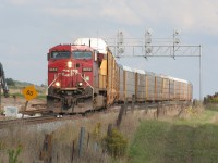 A lone CP GE begins to pull a string of auto racks out of the west end of CTC Wolverton on a late September afternoon.