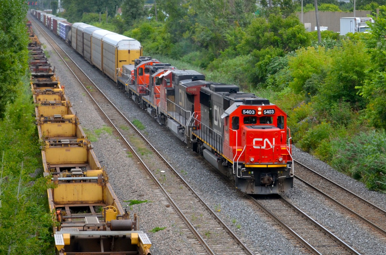 CN 401 had quite the lashup today: CN 5403, CN 2098, CN 7017, CN 7228 & CN 220. The lead two units had come into Quebec on Monday on CN U700 (loaded crude oil train). CN 5403 was originally Oakway 9028 and CN 2098 was originally ATSF 865. For more train photos, check out http://www.flickr.com/photos/mtlwestrailfan/ - See more at: http://www.railpictures.ca/?attachment_id=11153#sthash.99CgoQpZ.dpuf