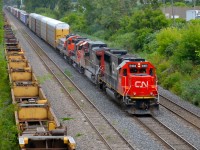 CN 401 had quite the lashup today: CN 5403, CN 2098, CN 7017, CN 7228 & CN 220. The lead two units had come into Quebec on Monday on CN U700 (loaded crude oil train). CN 5403 was originally Oakway 9028 and CN 2098 was originally ATSF 865. For more train photos, check out http://www.flickr.com/photos/mtlwestrailfan/ 