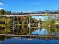 <b>Not often seen in Canada.</b> An FL9 pushes the Orford Express tourist train east over the famous ex-CP Eastman trestle. Ahead it are two RDC's, a dome car and an even more obscure model, an MLW M420TR. For more train photos, check out http://www.flickr.com/photos/mtlwestrailfan/ 