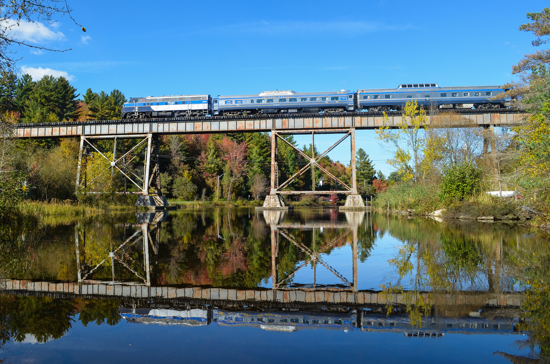 Not often seen in Canada. An FL9 pushes the Orford Express tourist train east over the famous ex-CP Eastman trestle. Ahead it are two RDC's, a dome car and an even more obscure model, an MLW M420TR. For more train photos, check out http://www.flickr.com/photos/mtlwestrailfan/