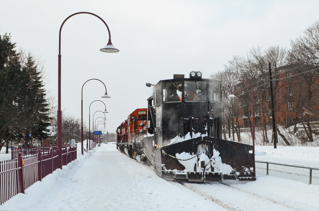 CP 5788, CP 5926 (both SD40-2's) & Jordan Spreader CP 402893 are about to tie up in front of the Montreal West station for a lunch break after plowing the Westmount Sub after some heavy snowfall. For more train photos, check out http://www.flickr.com/photos/mtlwestrailfan/