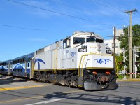 AMT 1341 (originally GO Transit 544) leads AMT 86 eastwards over Westminster Avenue on a Monday morning. The train is on its way to its next stop at Montreal West. This is the only F59PH on the AMT roster to receive this white paint scheme. For more train photos, check out http://www.flickr.com/photos/mtlwestrailfan/