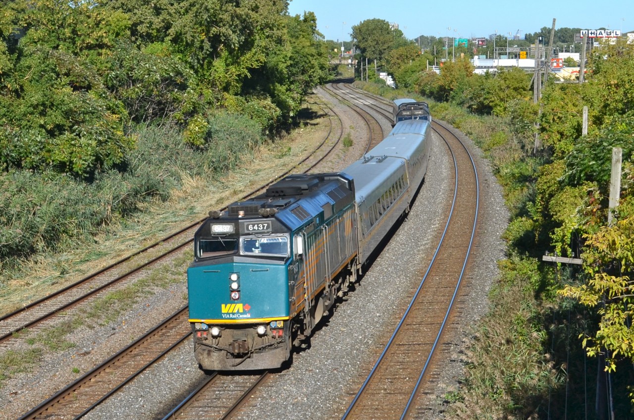 Combined VIA train's (J-Trains) are not a regular occurence in Montreal. Due to the VIA accident in Ottawa this morning, there were a number of them today. Here what may be VIA 65/VIA 659 heads west with VIA 6437 at the front and VIA 6448 tucked behind 3 LRC cars. Behind 6448 was another 2 LRC cars. For more train photos, check out http://www.flickr.com/photos/mtlwestrailfan/