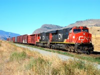 CN nos.2271&5714 are recovering from a signal stop just east of Kissick on the Ashcroft sub and are headed for Kamloops with a mixed freight.