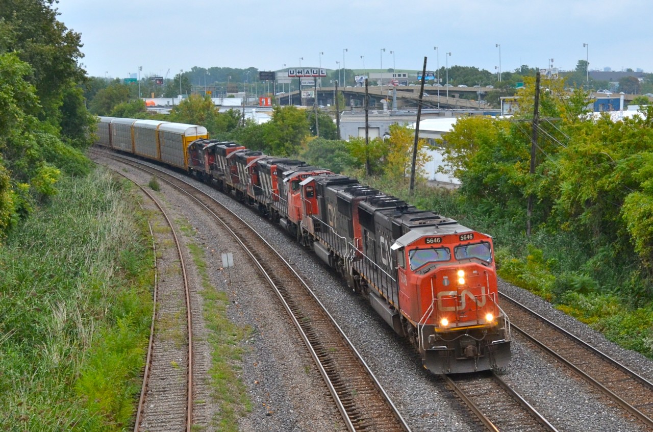 CN 401 had an unbelievable 7 units today, all GMD (two SD75I's and five geeps). Lashup was CN 5646, CN 5751, CN 9486, CN 4114, CN 4141, CN 4803 & CN 7062.