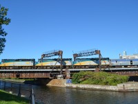 VIA 6408, VIA 6404 & VIA 6425 back the combined Ocean/Chaleur in to Central Station. They are crossing the Lachine Canal over what was once a lift bridge. This line was also once electrified many decades ago.