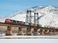 CN nos.2229&2270 are crossing the North Thompson River in Kamloops at the head of a westbound grain train.