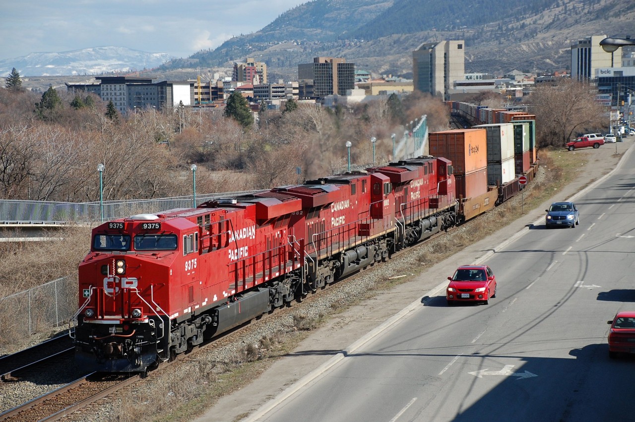 CP nos.9375,8882&8744 head west out of Kamloops in charge of an Intermodal.