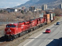 CP nos.9375,8882&8744 head west out of Kamloops in charge of an Intermodal.