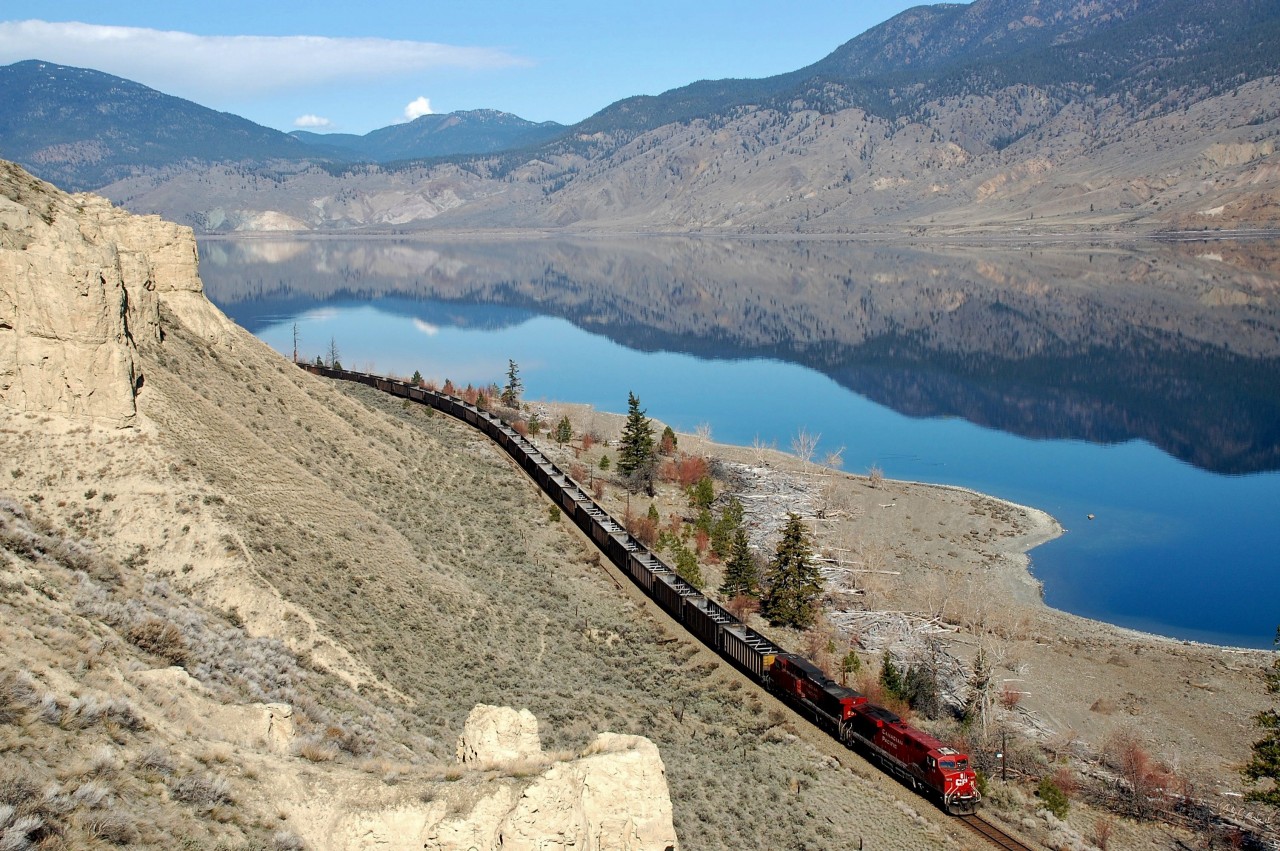 CP nos.8818&8510 bring an eastbound empty coal train alongside Kamloops Lake.