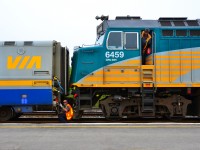 VIA Rail trains 52 and 50 operate joined from Toronto to Brockville. They usually are separated at Manitoba yard, west of Brockville Station, but today they are being split at the station. #52 (the front) does not pick up passengers at Brockville. It is due in Montréal at 11:55. #50 (the rear) picks up riders at Brockville and travels via Ottawa, where it is due at 11:12, to Montréal, which it is scheduled to reach at 13:18.