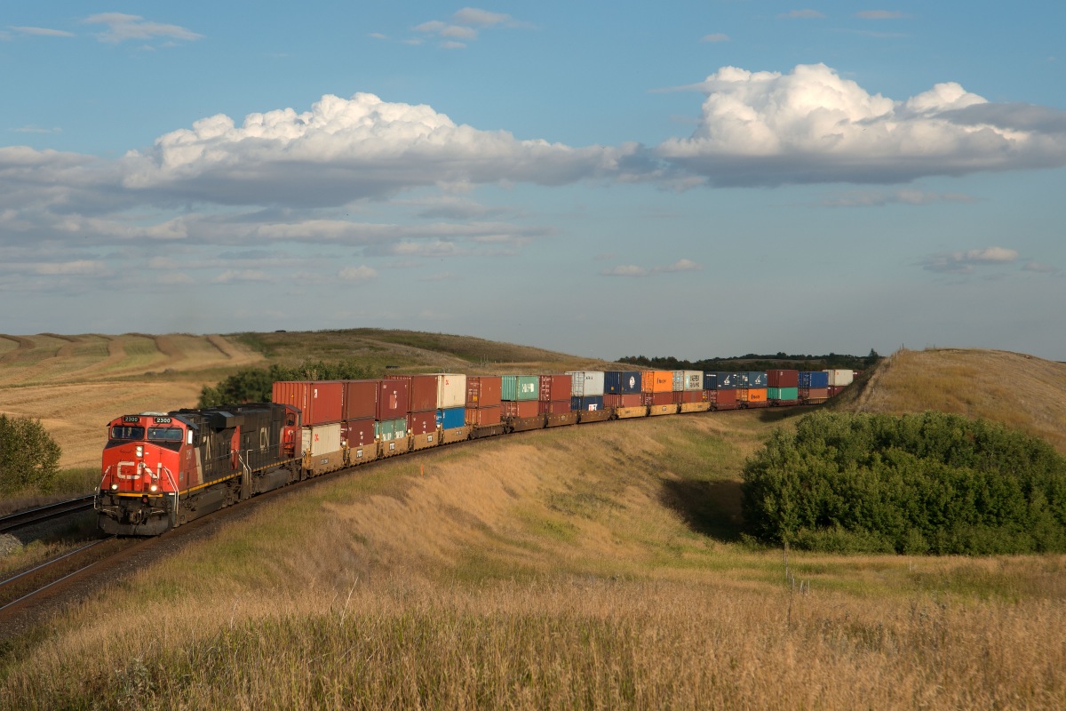 CN 111 is almost at the crew change point of Biggar as it climbs upgrade through Keppel, the track on the left is CP's Wilkie Sub.