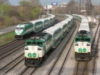 <a href=http://youtu.be/fu7LeqP99c8><b><u><i>Everything's Gone Green</i></u></b></a>.
<br><br>
GO F59PH 525 hauls inbound Lakeshore West train 906 eastbound to Union Station in between two not-in-service consists at Bathurst Street bridge, one with then-brand new MP40PH-3C 605 (equipment move 152 off the Milton line), and the other with GO's first and oldest F59PH, 520 (equipment move 206 off the Georgetown line). Both consits are heading west to Willowbrook after completing their morning runs and unloading their commuters downtown. The face of commuter railroading in Toronto for years, as time when on most of the earlier F59's including 520 and 525 have been retired and sold off, pushed out as 605's sisters were delivered and more of the New Order came online.