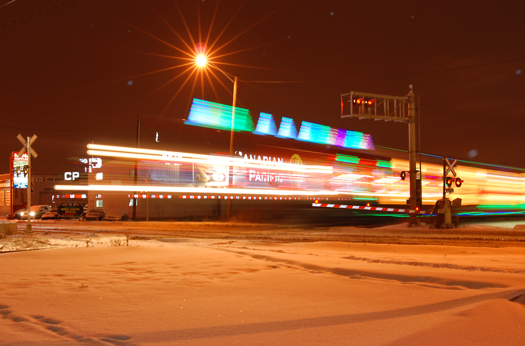 Possibly one of the best trains for long-exposure photography, the CP Holiday Train passes over the 99th Street crossing on the Scotford sub, just seconds away from joining up with the Leduc Sub.