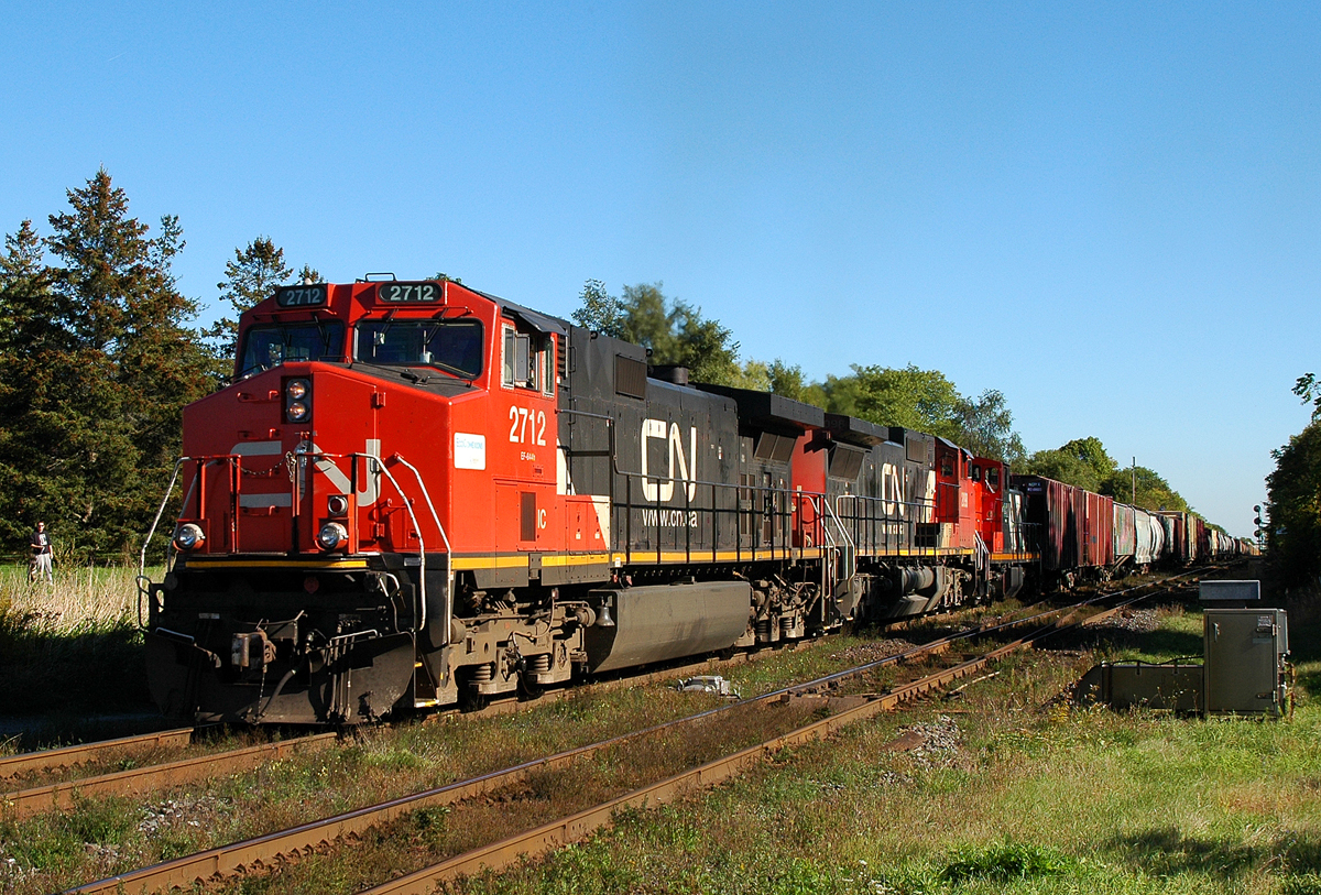Work at Brantford complete, 435 makes it's way past Hardy and out of town with IC 2712 - CN 2098 - CN 1412
