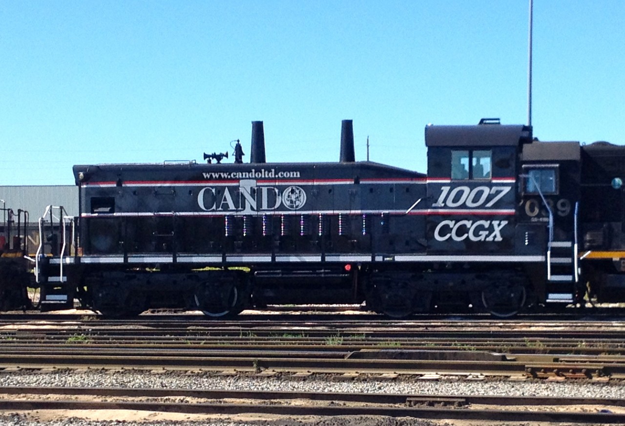 SW1200RS in Cando livery sits at Mac Yard waiting to be lifted for her owner. Cando Contracting Rail Service in Brandon, Manitoba.