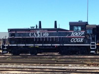 [ Rare location, rare (dissapearing) unit, we are allowing this image] SW1200RS in Cando livery sits at Mac Yard waiting to be lifted for her owner. Cando Contracting Rail Service in Brandon, Manitoba.