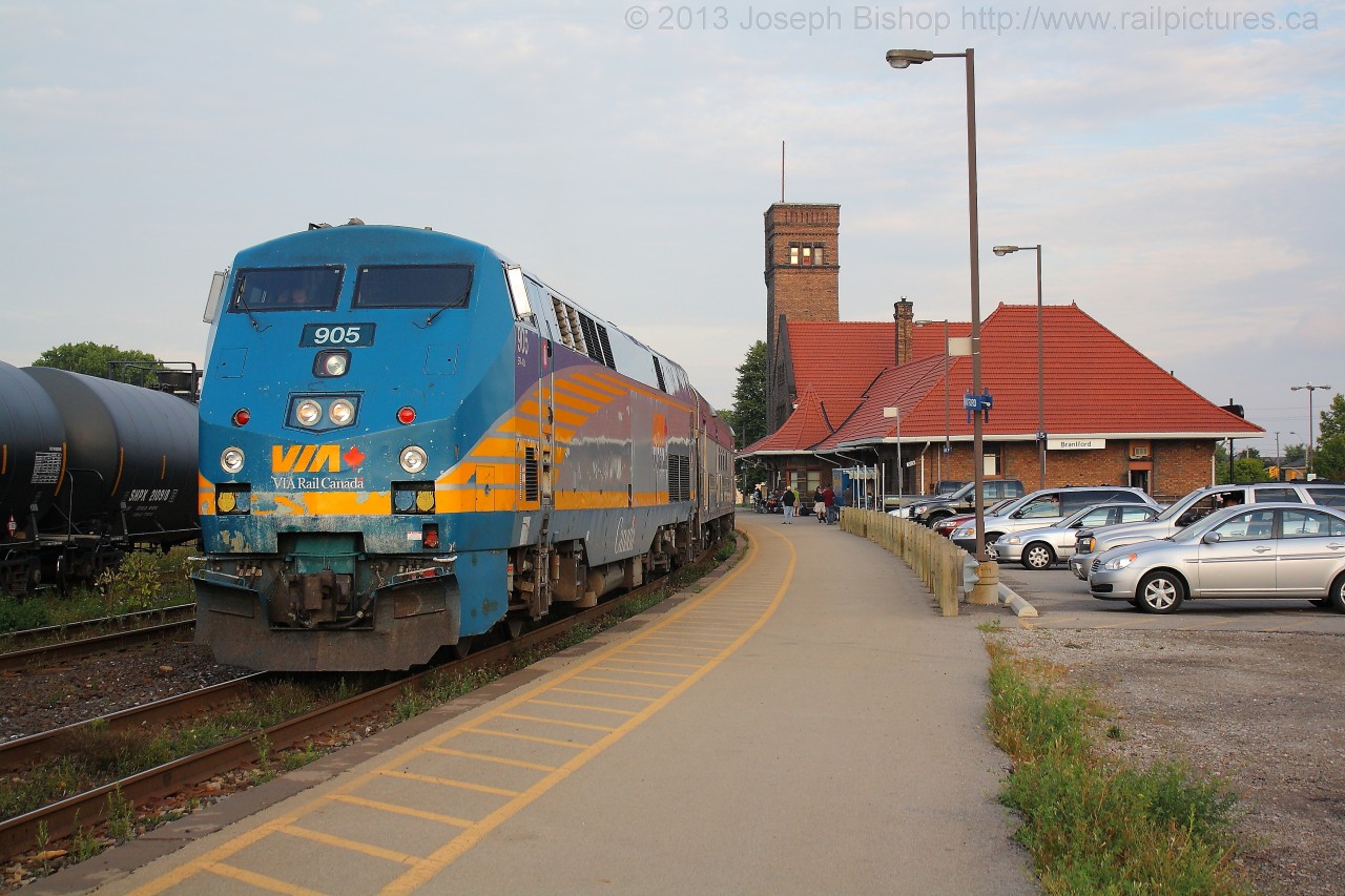 Via 81 with 905 leading has stopped at Brantford Ontario and will be continuing for points West shortly.  The sun was only minutes from setting when this photo was taken.